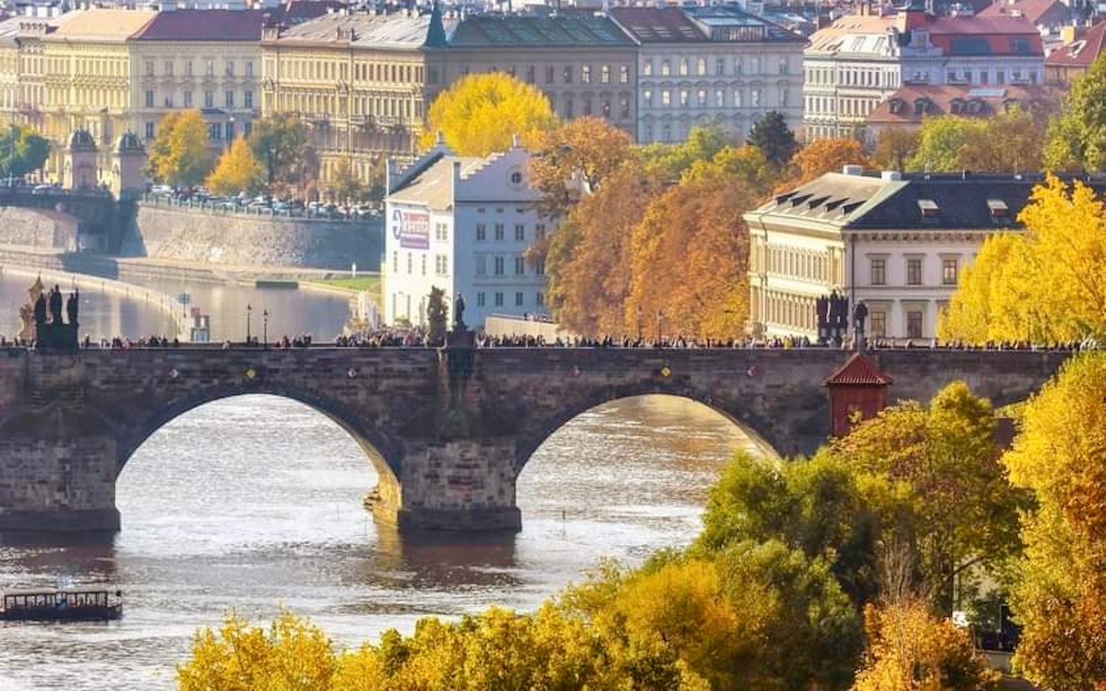 Photographing Charles Bridge and Autumn Prague from a Boat